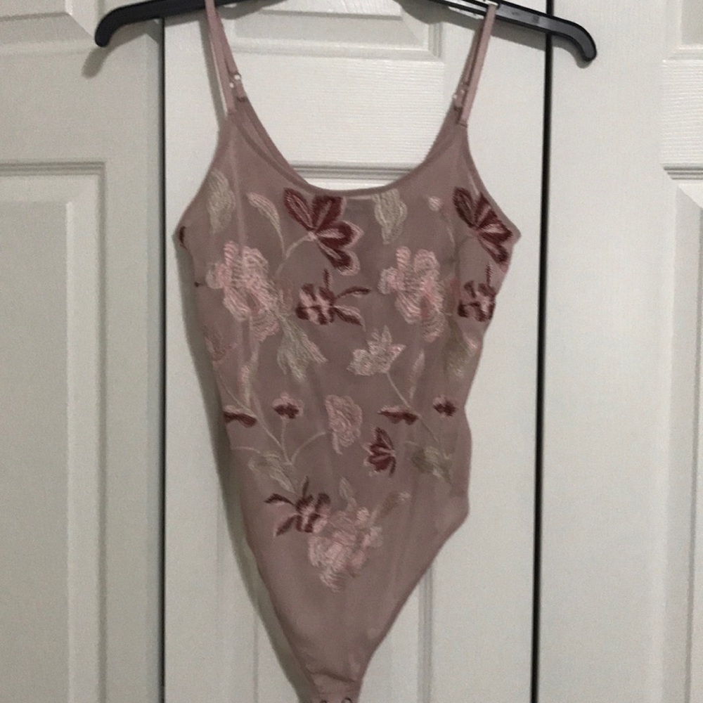 Express floral bodysuit. Never worn.